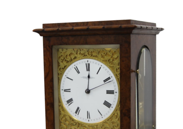 Wooden framed detailed antique clock